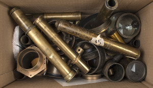 A collection of antique scentific instrument lenses and accessories,