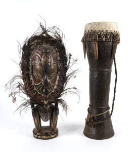 Totem figure and tribal drum, wood, feather and earth pigments, Papua New Guinea, 20th century,