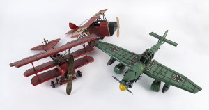 Three model planes, painted metal, 20th century,