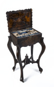 A Georgian sewing box on stand, simulated walnut with ornate brass fretwork, interior fitted with silk compartments filled with bone and pearl shell sewing accessories, early 19th century, - 2