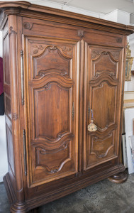 An impressive 18th century French walnut armoire,