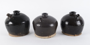Three Chinese brown glazed water pots, 19th century, the tallest 15cm high
