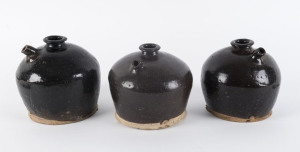 Three Chinese brown glazed water pots, 19th century, ​the tallest 15cm high
