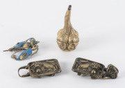Chinese brass belt buckle, Ming Dynasty; together with an 18th century Tibetan bronze four headed ornament and a Chinese 19th century butterfly wing hair ornament, ​bronze, 7.5cm high