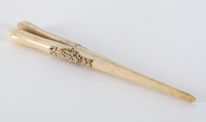 A Chinese carved ivory glove stretcher, 19th century, 24cm long