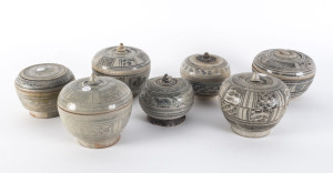 Seven Sawankhalok stoneware covered boxes, Thailand, 15th/16th century, the tallest 11cm high