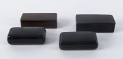 Four Georgian snuff boxes,papier-m&acirc;ch&eacute;, horn and timber, early 19th century, the largest 8.5cm across
