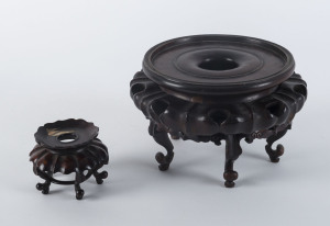 Two Chinese carved wooden stands, 19th/20th century, made to fit vases with 12.5cm and 7cm bases