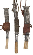 Three ceremonial knives, silver and bone, 19th century, ​the longest 23cm