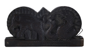 Pocket opium scales with carved elephant and Naga motif, Thailand, 19th century, ​16cm across