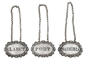 Set of three Georgian sterling silver decanter label by John Robins, London, circa 1809, 5.5cm across, 75 grams total