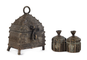 An Indian bronze betel nut belt box and a Malaysian betel nut and lime box, 19th century, tallest 12cm high