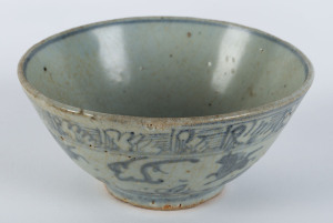 A Chinese blue and white ceramic bowl with prancing horse motif, Ming Dynasty, 16th century, 14cm diameter