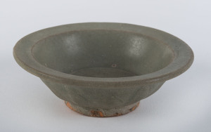 A Chinese celadon dish, 18th/19th century, ​12.5cm diameter