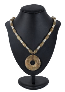 A Chinese jade necklace with pi disc, 19th/ 20th century,