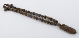 A Chinese bead necklace, carved jade and nuts, 19th/20th century,