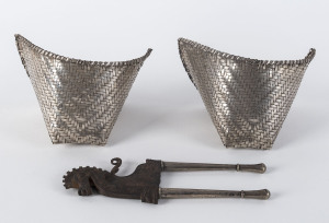 An Indonesian betel nut cutter in the form of a seahorse, plus a pair of woven silver rice steaming baskets, 20th century, cutter 19.5cm high