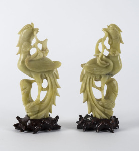 A pair of Chinese bowenite carved stone birds on wooden stands, 19th/20th century, ​14.5cm high