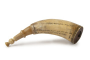 A scrimshaw powder horn with whaling scene engraved "Sperm Whaling, So Be Cheery My Lads, Let Your Hearts Never Fail, While The Bold Harpooner Is A-striking The Whale", 24.5cm long - 2