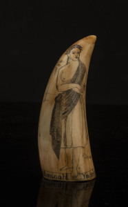 A scrimshaw whale's tooth with female portrait titled "Hannah Young nee Adams, Pitcairner, The Bounty", 13cm high