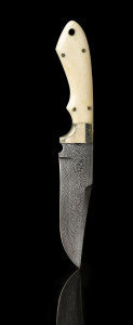A sailor's knife, fine Damascus steel blade with whalebone handle and brass fittings, Tasmanian origin, 20th century, ​21.5cm long