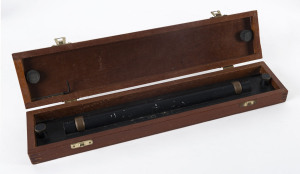 A brass rolling rule in a fitted wooden case, made by J. Halden & Co. Ltd. The ruler, used with maritime charts, measures 38cm inches in length and is finished in black. Comes with small adjusting pin.