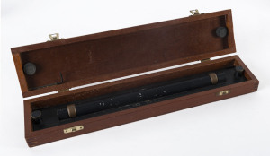 A brass rolling rule in a fitted wooden case, made by J. Halden & Co. Ltd. The ruler, used with maritime charts, measures 38cm inches in length and is finished in black. Comes with small adjusting pin.