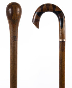 Two Australian timber walking sticks, one with gold collar, 19th century, 97cm and 98cm high