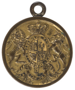 GENERAL POST OFFICE engraved brass fob with "No.35 INLAND LETr CARRIER" engraved on reverse and the English Royal Coat of Arms on the obverse. circa 1825. Extremely rare.