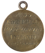 GENERAL POST OFFICE engraved brass fob with "No.35 INLAND LETr CARRIER" engraved on reverse and the English Royal Coat of Arms on the obverse. circa 1825. Extremely rare. - 2