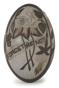 An Australian carved emu egg with kookaburras, snake, emus and "forget me not", 19th century, 13cm high