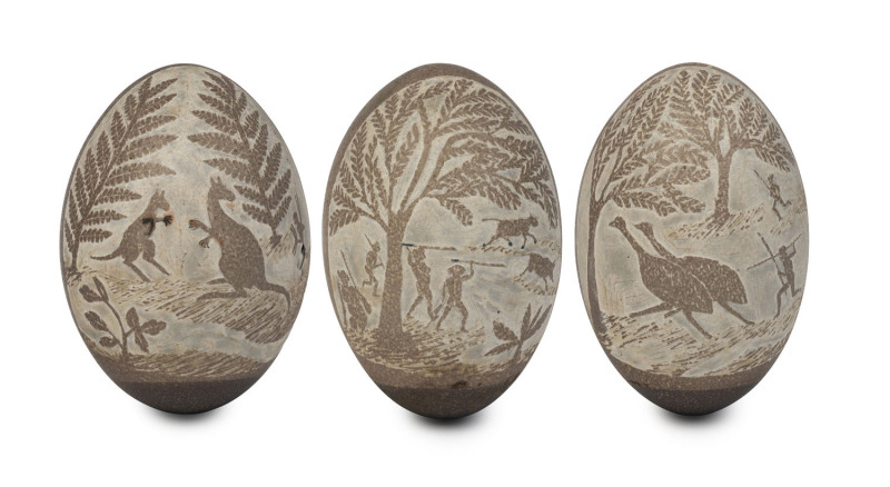 Three folk art carved emu eggs with Aboriginal hunting scenes, 19th century,