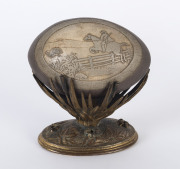 An Australian carved emu egg with emu hunt scene on gilt metal stand, 19th century, 15cm high