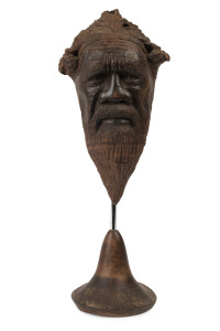 A portrait bust of an Aboriginal elder, carved mulga wood, 19th/20th century, 31cm overall​