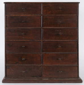A miniature chest of twelve drawers, cedar and pine with mahogany stain, 19th/20th century, 48cm high