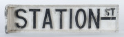 Two vintage Melbourne street signs, "STATION St." and "BRUNSWICK Rd.", 20th century,