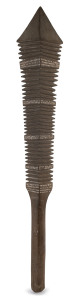 A Samoan war club with lozenge-shaped head and finely carved with incised geometric patterns; highlighted with lime, late 19th/early 20th century, 65cm long.