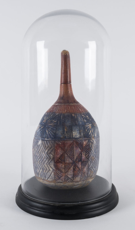 A carved and painted gourd, Pacific Islands, with glass dome, 20th century, dome 42cm high