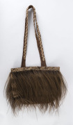 Papua New Guinea mask, necklace, cassowary feather bag and fly whisk, 20th century, ​the mask 60cm high - 2