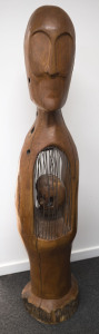 A tribal totem figure, carved wood, iron and stone, unknown origin, 20th century, 184cm high
