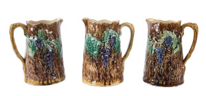 BENDIGO POTTERY Set of three majolica glazed harvest jugs, 19th century