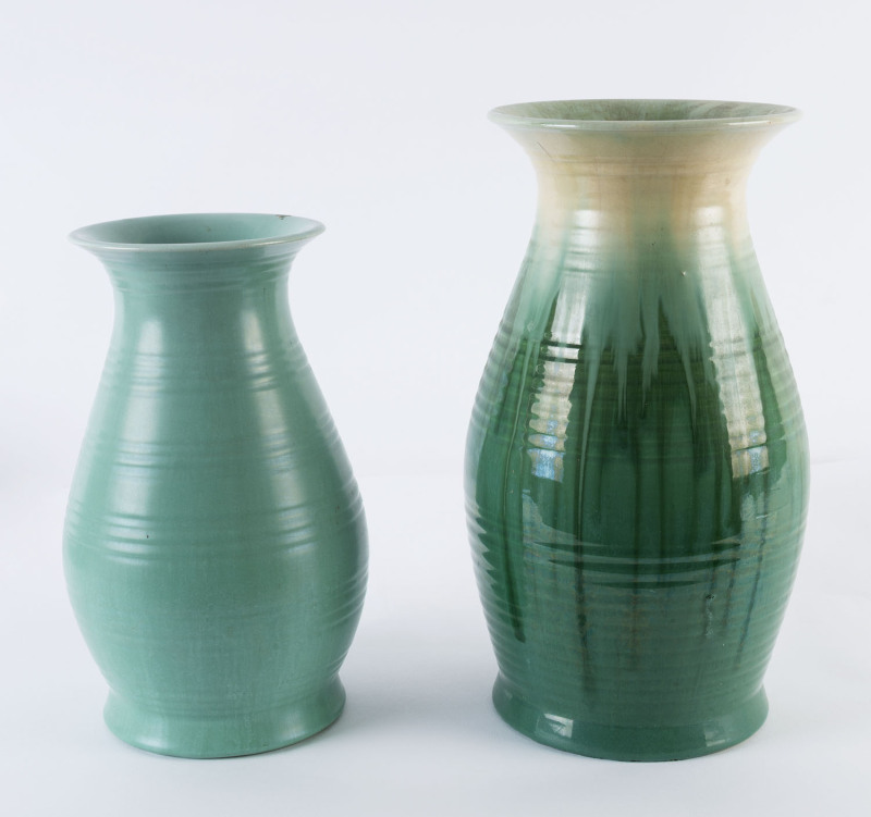 REMUED POTTERY: Two green glazed vases,