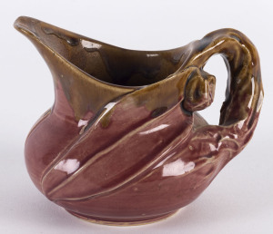 REMUED, MARGARET KERR (attributed), pink glazed gumleaf jug with early incised decoration, 9cm.