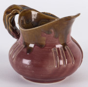 REMUED, MARGARET KERR (attributed), pink glazed gumleaf jug with early incised decoration, 9cm.  - 2