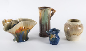 REMUED POTTERY: Four assorted pottery jugs and vases, incised "Remued", one with remains of foil label, the tallest 22.5cm high