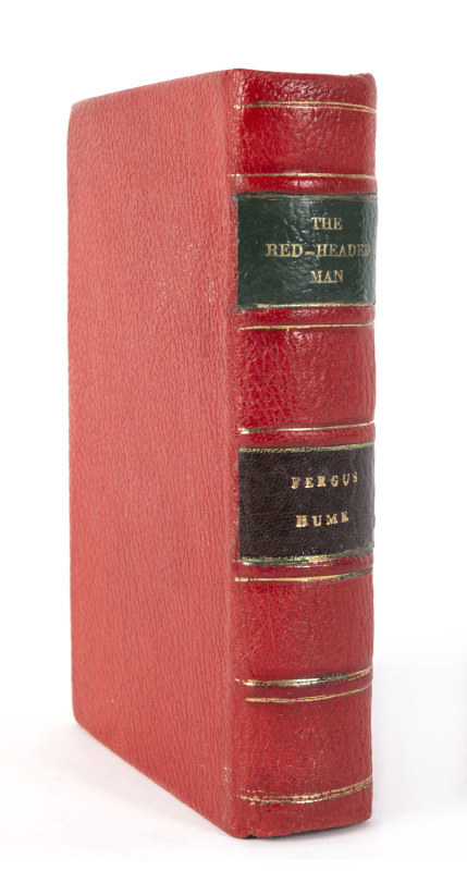 HUME, Fergus The Red-Headed Man [London; George Bell & Sons, 1899] 1st ed. 311p + adverts. Rebound in red leather with green and claret labels to spine; new end papers.