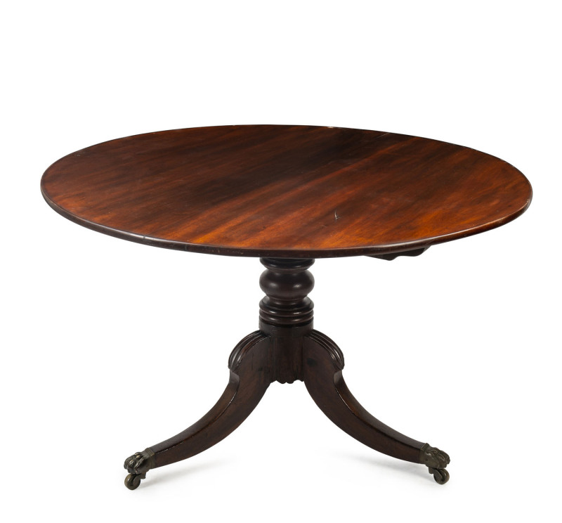 An early colonial breakfast table, cedar with brass clawfoot castors, Tasmanian origin, circa 1825, 77cm high, 118cm diameter