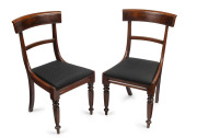 A fine pair of cedar spade back dining chairs with tapering hexagonal legs and veneered panel back, black upholstered drop-in seats, Tasmanian origin, circa 1840