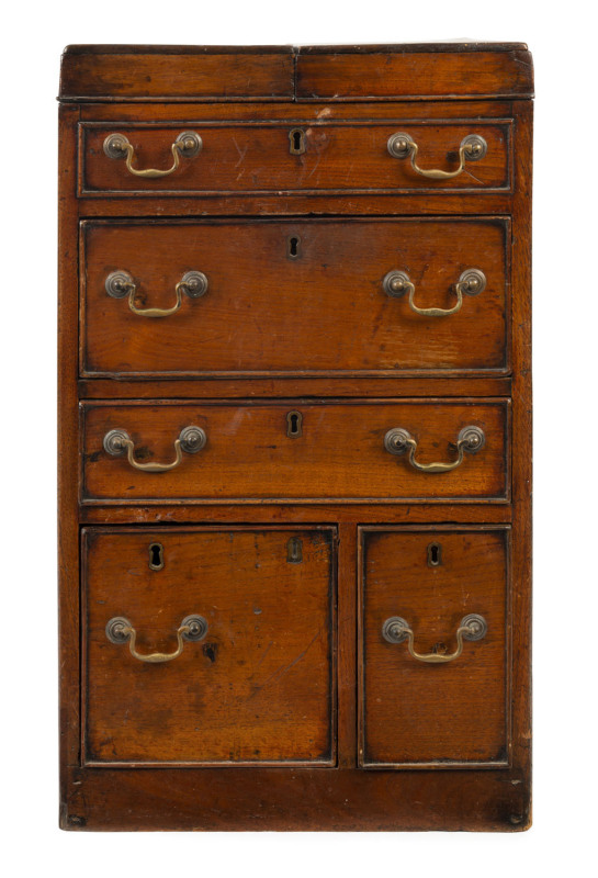 An early Colonial gentleman's washstand, red cedar, early 19th century, cedar and pine secondaries with ink inscriptions under drawers in Chinese. Anglo and Georgian in design this rare piece poses more questions than answers. It is well documented that