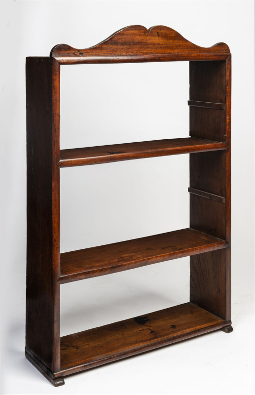 A primitive Colonial bookshelf, Australian cedar, South Australian origin, 19th century, 101cm high, 66cm wide, 21cm deep